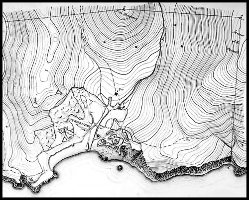 1885 – TERRANERA MINE SITE

This beautifully rendered 1885 map of the Terranera mine is a captivating window into a lost world, a masterpiece of 19th century cartography that documents the site just before its radical transformation. More than a mere survey, it is a historical chronicle etched in ink, detailing the general layout of the mine in its infancy. The most haunting feature is its depiction of a coastline that no longer exists, a ghost of a forgotten shoreline since devoured by industrial ambition. What was once part of the Tyrrhenian coast is now a vast, brackish lake occupying the void of an immense open-cut quarry, with the prominent rock outcrop visible in modern photographs still firmly connected to the mainland.

The map meticulously illustrates the embryonic stages of the operation: the first tentative terraces carved into the hillsides and the initial rudimentary open cuts. These features, though significant for their time, appear almost delicate compared to the gargantuan amphitheater that would dominate the landscape in the 20th  century. This map is therefore an invaluable testament, capturing the precise moment before the mine’s expansion began to irrevocably reshape the very geography of the island, making it a poignant and beautiful record of a landscape on the precipice of profound change. (Author: silvia)