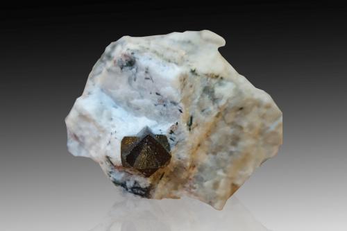 Loparita-(Ce)<br />Macizo Khibiny, Península Kola, Murmanskaja Oblast, Región del Norte, Rusia<br />6.5 x 4.5 x 4.5 cm / Cristal principal: 1.2 cm.<br /> (Autor: Museo MIM)