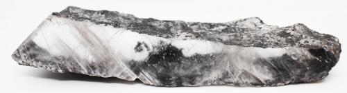 Proustita incluida en Yeso<br />Mina La Platosa, Bermejillo, Municipio Mapimí, Durango, México<br />115x20x23 mm.<br /> (Autor: Luis Edmundo Sánchez Roja)