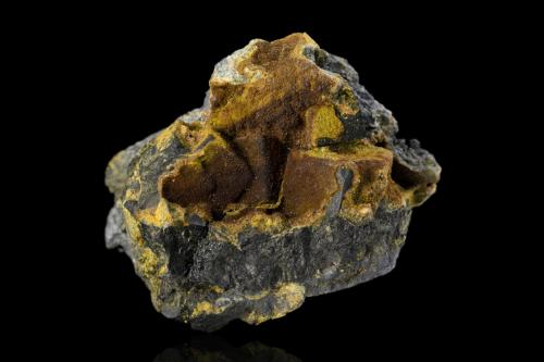 Uraninite with Uranophane<br />Shinkolobwe, Cinturón de cobre de Katanga, Katanga (Shaba), República Democrática del Congo (Zaire)<br />6.5 x 4.5 x 5 cm / main crystal: 1.3 cm.<br /> (Author: MIM Museum)