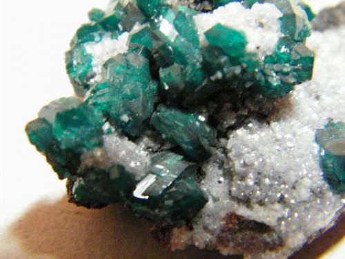 Dioptase on Calcite<br />Tsumeb Mine, Tsumeb, Otjikoto Region, Namibia<br />50x35mm<br /> (Author: Heimo Hellwig)