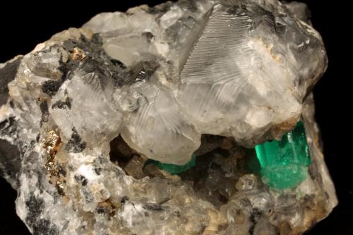 Beryl (variety emerald), Calcite, Pyrite<br />La Pita mining district, Municipio Maripí, Western Emerald Belt, Boyacá Department, Colombia<br />7cm across<br /> (Author: Fiebre Verde)