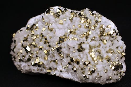 Pyrite, Calcite<br />Grupo Minero El Carrizal, La Llave, Zimapán, Municipio Zimapán, Hidalgo, México<br />8.7 x 5.5 x 2.9 centimeters<br /> (Author: Ricardo Melendez)