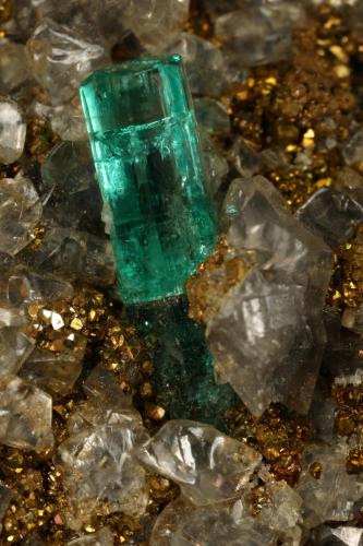 Beryl (Var. Emerald), Dolomite, Pyrite<br />Chivor mining district, Palo Arañado Mine, Municipio Chivor, Eastern Emerald Belt, Boyacá Department, Colombia<br />63x45x15mm, main xl=10mm<br /> (Author: Fiebre Verde)