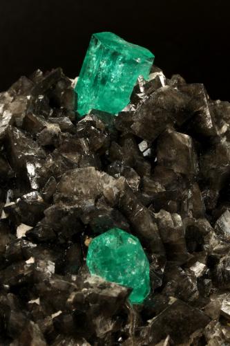 Beryl (variety emerald), Calcite, Pyrite<br />Coscuez mining district, Municipio San Pablo de Borbur, Western Emerald Belt, Boyacá Department, Colombia<br />78x53x78mm, xls= 11x9mm & 15x12mm<br /> (Author: Fiebre Verde)