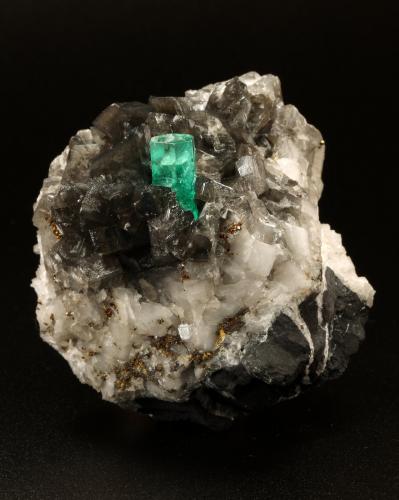 Beryl (variety emerald), Calcite, Pyrite<br />La Pita mining district, Cunas Mine, Municipio Maripí, Western Emerald Belt, Boyacá Department, Colombia<br />50x50x45mm, xl=11x7mm<br /> (Author: Fiebre Verde)