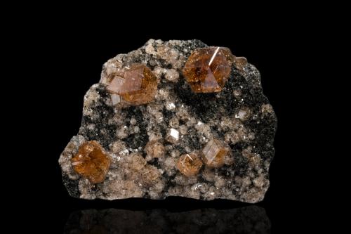 Grossular<br />Jeffrey Mine, Asbestos, Les Sources RCM, Estrie, Québec, Canada<br />10,5	x	9,0	x	6,5	cm<br /> (Author: MIM Museum)