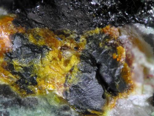 Uraninite, Schoepite<br />Senhora da Assunção Mine, Aldeia Nova, Ferreira de Aves, Sátão, Viseu District, Portugal<br />FOV 1 cm<br /> (Author: Cesar M. Salvan)