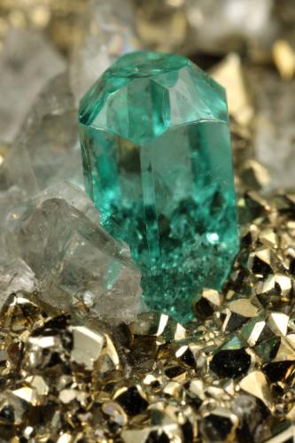 Beryl (variety emerald), Calcite, Pyrite<br />Chivor mining district, El Acuario Mine, Municipio Chivor, Eastern Emerald Belt, Boyacá Department, Colombia<br />92x41x52mm, main xl=4mm<br /> (Author: Fiebre Verde)