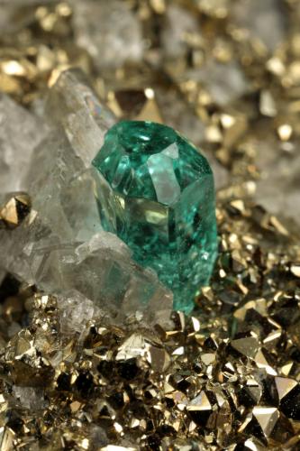 Beryl (variety emerald), Calcite, Pyrite<br />Chivor mining district, El Acuario Mine, Municipio Chivor, Eastern Emerald Belt, Boyacá Department, Colombia<br />92x41x52mm, main xl=4mm<br /> (Author: Fiebre Verde)