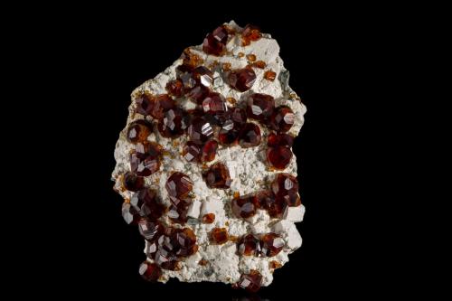 Spessartine on Orthoclase<br />Tongbei, Yunxiao, Zhangzhou Prefecture, Fujian Province, China<br />11,5	x	8,5	x	5,0	cm<br /> (Author: MIM Museum)