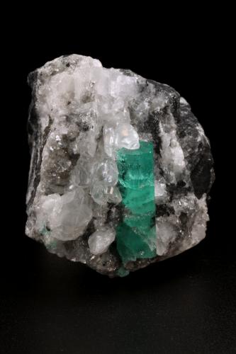 Beryl (variety emerald), Calcite<br />La Pita mining district, Polveros Mine, Municipio Maripí, Western Emerald Belt, Boyacá Department, Colombia<br />41x52x59mm, xl=26x9mm<br /> (Author: Fiebre Verde)