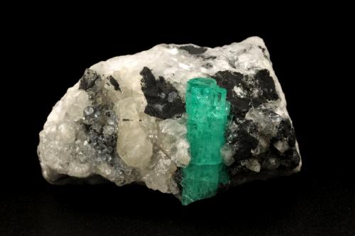 Beryl (variety emerald), Calcite<br />Muzo mining district, Western Emerald Belt, Boyacá Department, Colombia<br />58x31x34mm, crystal aggregate=25x8mm<br /> (Author: Fiebre Verde)