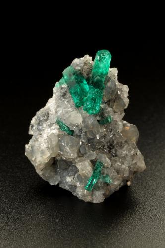 Beryl (variety emerald), Calcite, Dolomite, Pyrite<br />La Pita mining district, Cunas Mine, Municipio Maripí, Western Emerald Belt, Boyacá Department, Colombia<br />28x33x28mm, main xls=18mm & 9mm<br /> (Author: Fiebre Verde)