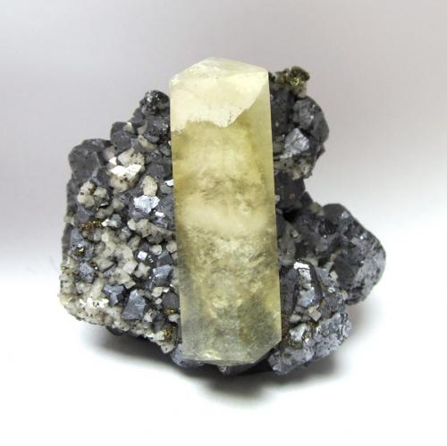 Calcite, galena, dolomite, chalcopyrite<br />Sweetwater Mine, Ellington, Viburnum Trend District, Reynolds County, Missouri, USA<br />Specimen size 6 cm, calcite crystal 5 cm<br /> (Author: Tobi)