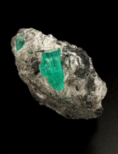 Beryl (variety emerald), Calcite<br />Coscuez mining district, Municipio San Pablo de Borbur, Western Emerald Belt, Boyacá Department, Colombia<br />44x41x23mm, xl=15x9x7mm<br /> (Author: Fiebre Verde)