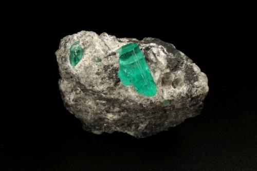 Beryl (variety emerald), Calcite<br />Coscuez mining district, Municipio San Pablo de Borbur, Western Emerald Belt, Boyacá Department, Colombia<br />44x41x23mm, xl=15x9x7mm<br /> (Author: Fiebre Verde)