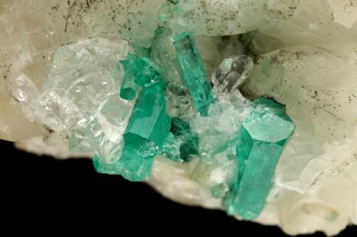 Beryl (variety emerald), Calcite, Quartz, Goethite<br />Peñas Blancas Mine, Municipio San Pablo de Borbur, Western Emerald Belt, Boyacá Department, Colombia<br />49x52x70mm, main xl=7x4mm<br /> (Author: Fiebre Verde)