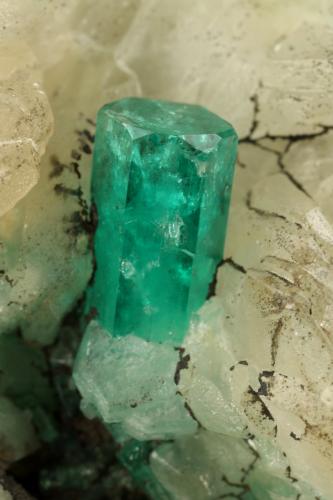 Beryl (variety emerald), Calcite, Quartz, Goethite<br />Mina Peñas Blancas, Municipio San Pablo de Borbur, Cinturón Esmeraldífero Occidental, Departamento Boyacá, Colombia<br />49x52x70mm, main xl=7x4mm<br /> (Author: Fiebre Verde)