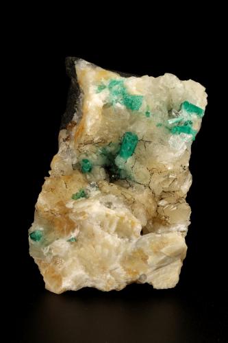 Beryl (variety emerald), Calcite, Quartz, Goethite<br />Mina Peñas Blancas, Municipio San Pablo de Borbur, Cinturón Esmeraldífero Occidental, Departamento Boyacá, Colombia<br />49x52x70mm, main xl=7x4mm<br /> (Author: Fiebre Verde)
