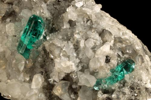 Beryl (variety emerald), Calcite, Dolomite, Pyrite<br />Chivor mining district, Municipio Chivor, Eastern Emerald Belt, Boyacá Department, Colombia<br />78x40x34mm, xls=12 & 11mm<br /> (Author: Fiebre Verde)