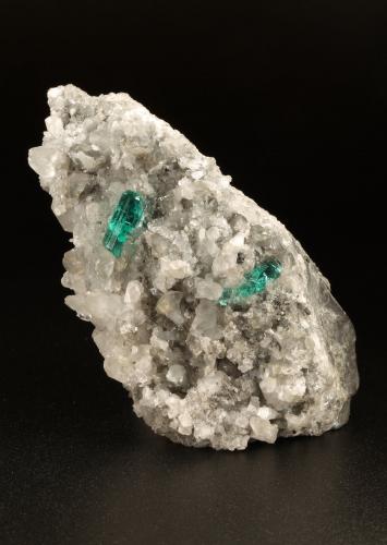 Beryl (variety emerald), Calcite, Dolomite, Pyrite<br />Chivor mining district, Municipio Chivor, Eastern Emerald Belt, Boyacá Department, Colombia<br />78x40x34mm, xls=12 & 11mm<br /> (Author: Fiebre Verde)