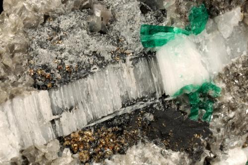 Beryl (variety emerald), Calcite, Pyrite<br />La Pita mining district, Cunas Mine, Municipio Maripí, Western Emerald Belt, Boyacá Department, Colombia<br />80x40x90mm - xls up to 8mm<br /> (Author: Fiebre Verde)