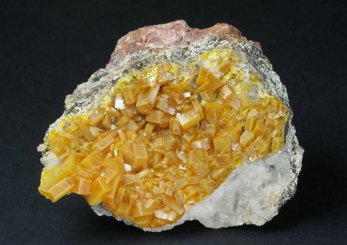 Wulfenite<br />Stevenson-Bennett Mine, Organ Mountains, Organ District, Doña Ana County, New Mexico, USA<br />63 x 55 x 42 mm<br /> (Author: GneissWare)