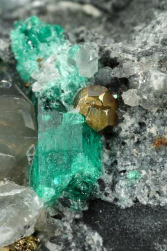 Beryl (variety emerald), Calcite, Dolomite, Pyrite<br />La Pita mining district, Municipio Maripí, Western Emerald Belt, Boyacá Department, Colombia<br />98x83x35mm, longest xl=20mm<br /> (Author: Fiebre Verde)