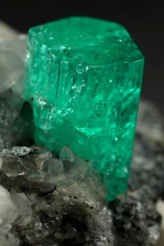 Beryl (variety emerald), Calcite, Dolomite, Pyrite<br />Coscuez mining district, Municipio San Pablo de Borbur, Western Emerald Belt, Boyacá Department, Colombia<br />27x24x35mm, xl=9x6mm<br /> (Author: Fiebre Verde)