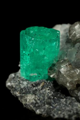 Beryl (variety emerald), Calcite, Dolomite, Pyrite<br />Coscuez mining district, Municipio San Pablo de Borbur, Western Emerald Belt, Boyacá Department, Colombia<br />27x24x35mm, xl=9x6mm<br /> (Author: Fiebre Verde)