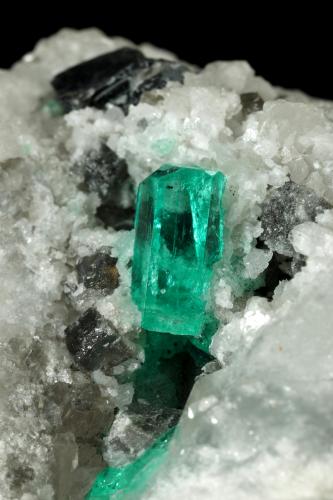 Beryl (variety emerald), Calcite, Dolomite<br />Coscuez mining district, Municipio San Pablo de Borbur, Western Emerald Belt, Boyacá Department, Colombia<br />85x50x50mm, xl=10mm<br /> (Author: Fiebre Verde)