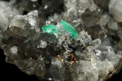 Beryl (variety emerald), Calcite, Dolomite, Pyrite, Quartz<br />La Pita mining district, Cunas Mine, Municipio Maripí, Western Emerald Belt, Boyacá Department, Colombia<br />66x49x24mm, main xl=6x4mm<br /> (Author: Fiebre Verde)