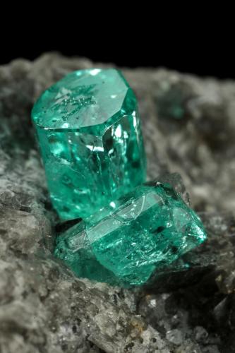 Beryl (variety emerald), Calcite, Dolomite<br />Chivor mining district, Municipio Chivor, Eastern Emerald Belt, Boyacá Department, Colombia<br />87x64x61mm, largest xl=5mm<br /> (Author: Fiebre Verde)