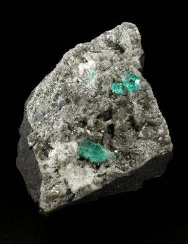 Beryl (variety emerald), Calcite, Dolomite<br />Chivor mining district, Municipio Chivor, Eastern Emerald Belt, Boyacá Department, Colombia<br />87x64x61mm, largest xl=5mm<br /> (Author: Fiebre Verde)