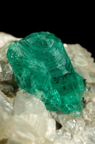 Beryl (variety emerald), Calcite, Pyrite<br />Chivor mining district, Municipio Chivor, Eastern Emerald Belt, Boyacá Department, Colombia<br />35x23x20mm, xl=9mm<br /> (Author: Fiebre Verde)