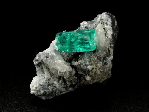 Beryl (variety emerald), Calcite<br />Chivor mining district, Municipio Chivor, Eastern Emerald Belt, Boyacá Department, Colombia<br />43x24x24mm, xl=15x8mm<br /> (Author: Fiebre Verde)