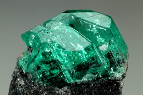 Beryl (variety emerald)<br />Chivor mining district, Municipio Chivor, Eastern Emerald Belt, Boyacá Department, Colombia<br />aggregate=18x13mm<br /> (Author: Fiebre Verde)