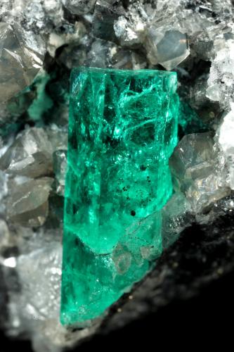 Beryl (variety emerald), Calcite, Dolomite, Pyrite<br />La Pita mining district, Cunas Mine, Municipio Maripí, Western Emerald Belt, Boyacá Department, Colombia<br />41x31x25mm, xl=17mm<br /> (Author: Fiebre Verde)