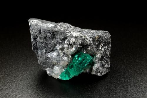 Beryl (variety emerald), Calcite, Dolomite, Pyrite<br />La Pita mining district, Cunas Mine, Municipio Maripí, Western Emerald Belt, Boyacá Department, Colombia<br />41x31x25mm, xl=17mm<br /> (Author: Fiebre Verde)