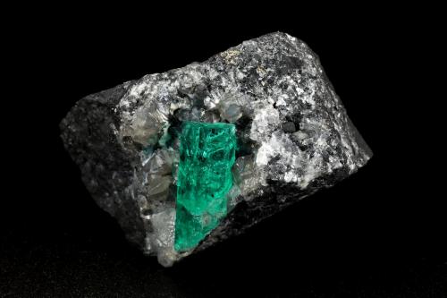 Beryl (variety emerald), Calcite, Dolomite, Pyrite<br />La Pita mining district, Cunas Mine, Municipio Maripí, Western Emerald Belt, Boyacá Department, Colombia<br />41x31x25mm, xl=17mm<br /> (Author: Fiebre Verde)