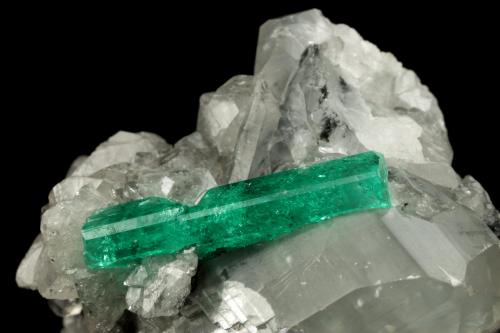 Beryl (variety emerald), Calcite, Dolomite<br />La Pita mining district, Municipio Maripí, Western Emerald Belt, Boyacá Department, Colombia<br />55x40x35mm, xl=22mm<br /> (Author: Fiebre Verde)