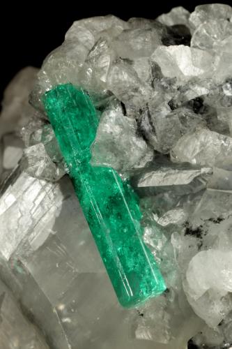 Beryl (variety emerald), Calcite, Dolomite<br />La Pita mining district, Municipio Maripí, Western Emerald Belt, Boyacá Department, Colombia<br />55x40x35mm, xl=22mm<br /> (Author: Fiebre Verde)