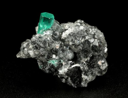 Beryl (variety emerald), Calcite<br />La Pita mining district, Municipio Maripí, Western Emerald Belt, Boyacá Department, Colombia<br />27x34x10mm, xl=10x4.5mm<br /> (Author: Fiebre Verde)