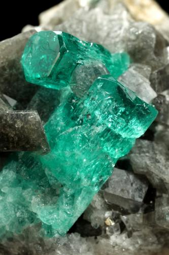 Beryl (variety emerald), Calcite, Pyrite<br />Chivor mining district, Municipio Chivor, Eastern Emerald Belt, Boyacá Department, Colombia<br />38x24x29mm, largest xl=17mm<br /> (Author: Fiebre Verde)