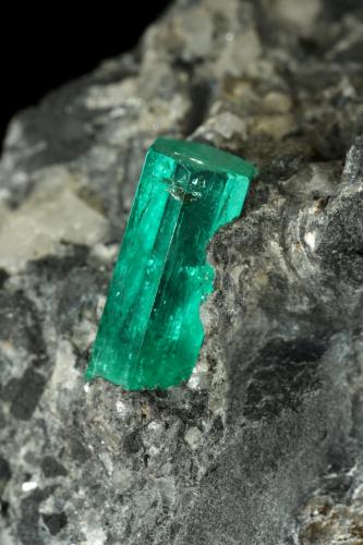 Beryl (variety emerald), Calcite, Pyrite<br />La Pita mining district, Municipio Maripí, Western Emerald Belt, Boyacá Department, Colombia<br />38x63x65mm, xl=10mm<br /> (Author: Fiebre Verde)