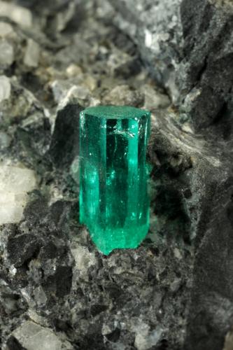 Beryl (variety emerald), Calcite, Pyrite<br />La Pita (distrito minero), Municipio Maripí, Cinturón Esmeraldífero Occidental, Departamento Boyacá, Colombia<br />38x63x65mm, xl=10mm<br /> (Author: Fiebre Verde)