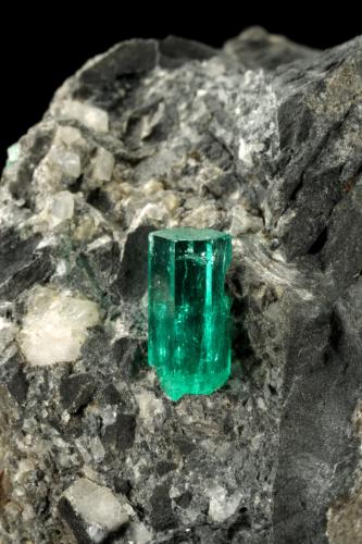 Beryl (variety emerald), Calcite, Pyrite<br />La Pita mining district, Municipio Maripí, Western Emerald Belt, Boyacá Department, Colombia<br />38x63x65mm, xl=10mm<br /> (Author: Fiebre Verde)