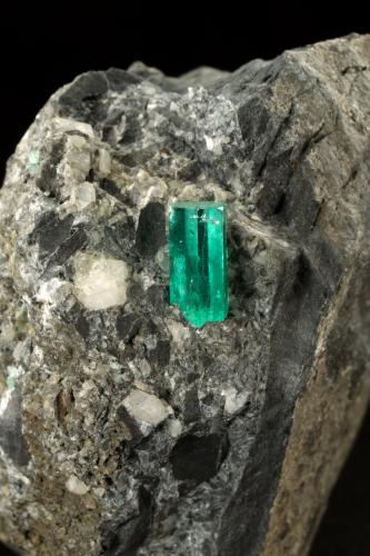 Beryl (variety emerald), Calcite, Pyrite<br />La Pita mining district, Municipio Maripí, Western Emerald Belt, Boyacá Department, Colombia<br />38x63x65mm, xl=10mm<br /> (Author: Fiebre Verde)