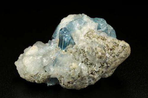 Euclase, Calcite, Pyrite<br />Gachalá mining district, Municipio Gachalá, Eastern Emerald Belt, Cundinamarca Department, Colombia<br />44x26x34mm, up to 7mm<br /> (Author: Fiebre Verde)